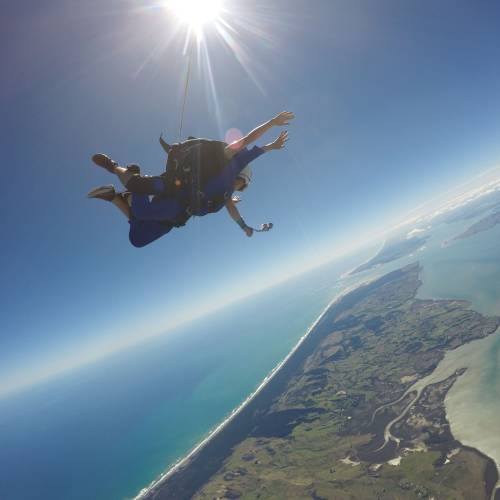 People skydiving