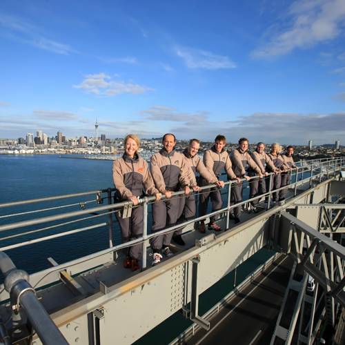 People standing on bridge