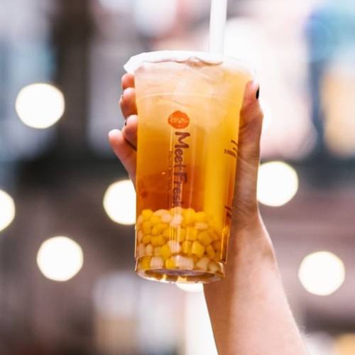 hand holding drink
