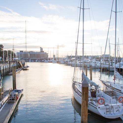 Waterfront with sails and sea