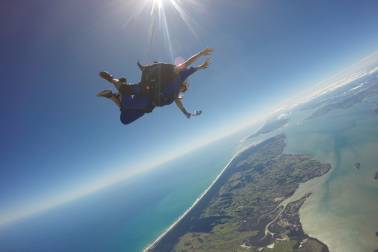 People skydiving