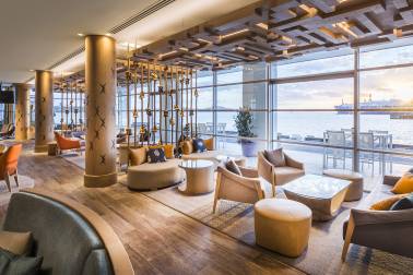 Bar seating area with the waterfront outside