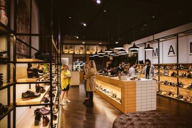 People looking at footwear