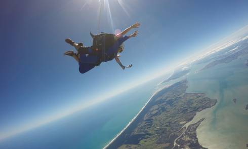 People skydiving