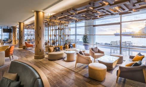 Bar seating area with the waterfront outside
