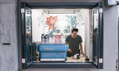 Window opening with a coffee machine