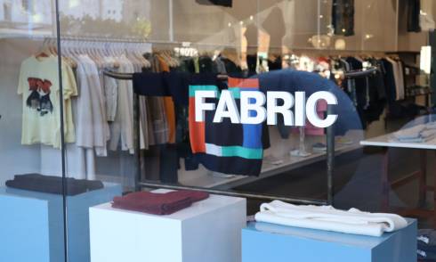 Fabric logo on outside of store