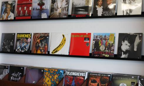  Pop music records displayed on shelf 