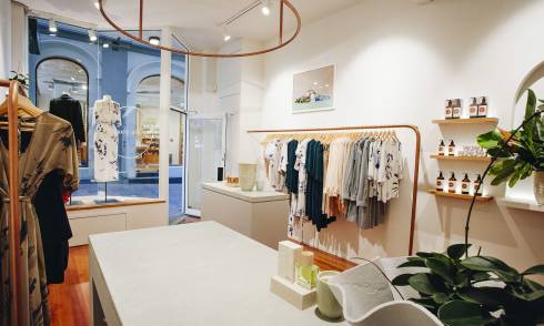 Wide view of showroom with garments on display
