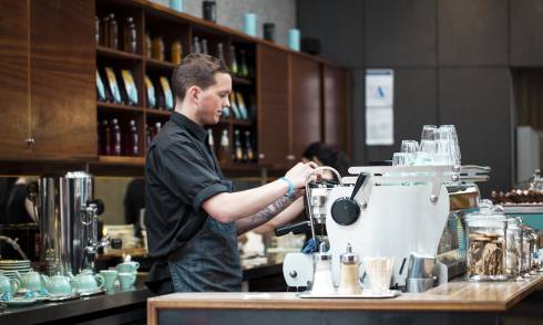Barista making coffee