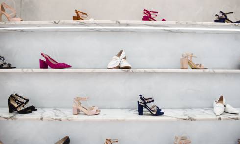 Shelf displaying womens shoes