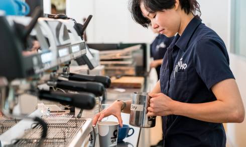 Barista making coffee