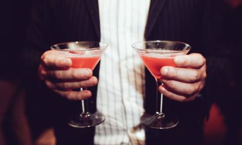 Person holding drinks