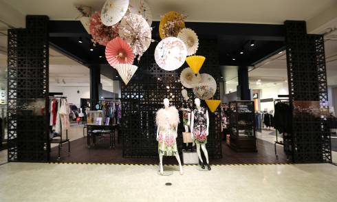 Mannequins displaying dresses along side Japanese Oil-paper umbrellas