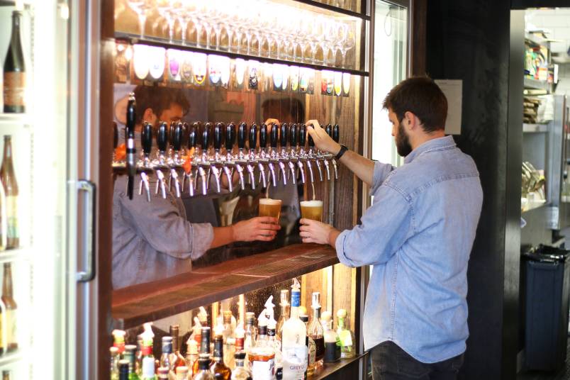 Bartender pouring beer