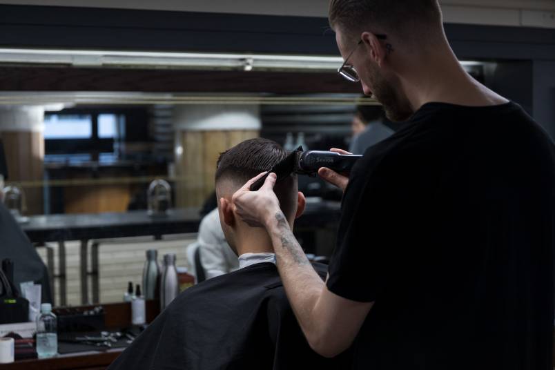 man getting a hair cut
