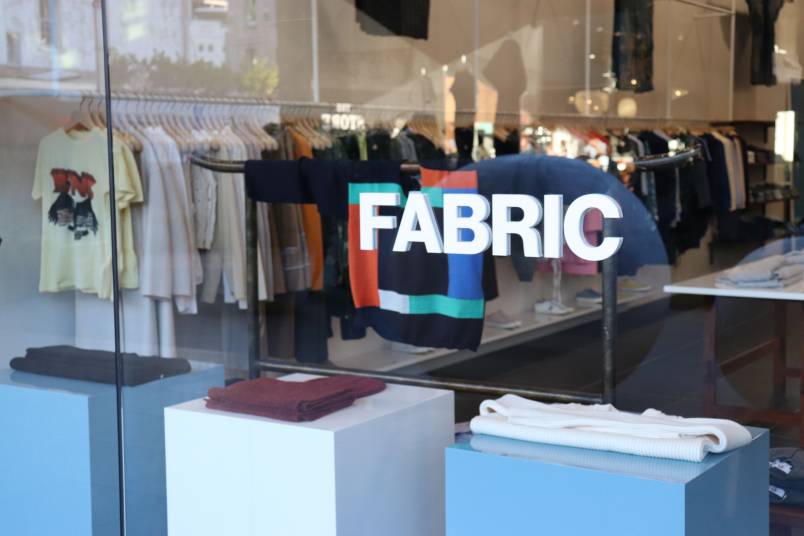 Fabric logo on outside of store